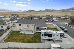 Aerial view featuring a residential view and a mountain view