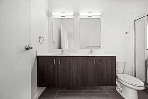 Bathrooms featuring floating adult-height vanities with undermount sinks.