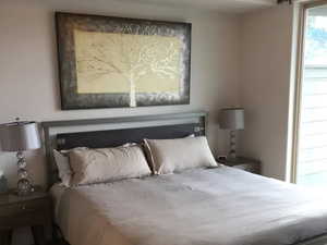 Bedroom featuring visible vents