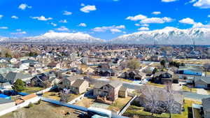 Drone / aerial view with a mountain view and a residential view