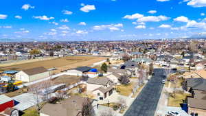 Birds eye view of property with a residential view