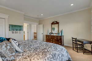 Bedroom featuring crown molding, carpet floors, recessed lighting, and baseboards