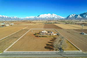 Drone / aerial view with a mountain view and a rural view