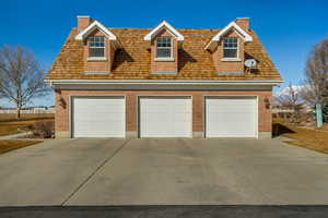 Garage featuring a detached garage