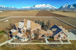 Birds eye view of property featuring a rural view and a mountain view