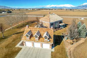 Birds eye view of property featuring a mountain view and a rural view