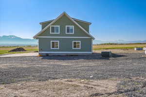 View of home's exterior with a mountain view