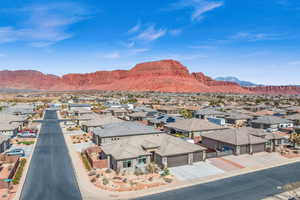 Property view of mountains with a residential view