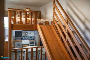 Details of the "Kids room" play area and slide that come down from the loft bed.