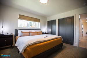 View of the 3rd bedroom on the main level of the home featuring two closets.