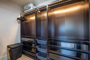 View of the walk in closet in the master bedroom.