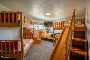 What we call the "Kids room" which includes a play kitchen underneath the loft bed.