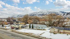 Property view of mountains featuring a residential view