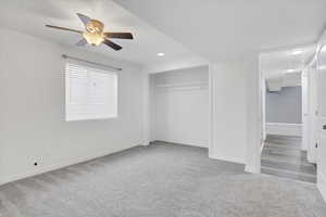 Unfurnished bedroom featuring baseboards, a ceiling fan, carpet, a closet, and recessed lighting