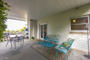 View of patio featuring outdoor dining area