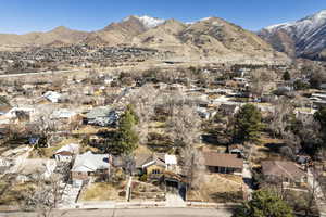 Property view of mountains with a residential view