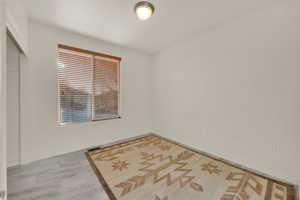 Unfurnished room featuring baseboards