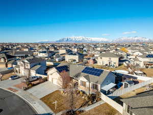 Drone / aerial view featuring a mountain view and a residential view