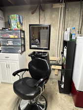 Interior space featuring washer / clothes dryer and unfinished concrete flooring