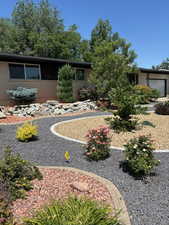 View of yard with a garage