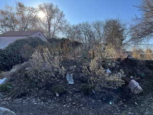 View of yard featuring fence