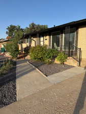 View of front of property featuring brick siding