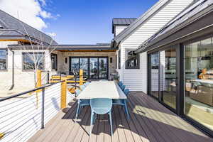 Wooden deck with outdoor dining area