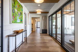 Doorway featuring wood finished floors