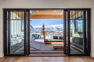 Entryway featuring wood finished floors and a mountain view