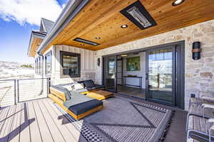 Deck featuring outdoor lounge area