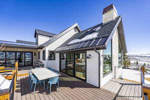 Wooden deck with outdoor dining space