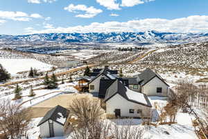 Snowy aerial view with a mountain view