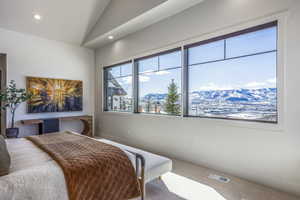 Bedroom featuring baseboards, visible vents, vaulted ceiling, carpet floors, and recessed lighting