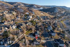 Birds eye view of property featuring a residential view and a mountain view