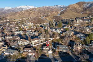 Drone / aerial view featuring a residential view and a mountain view