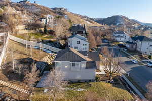 Birds eye view of property featuring a residential view and a mountain view