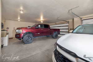 Garage featuring visible vents