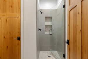 Full bathroom with a stall shower