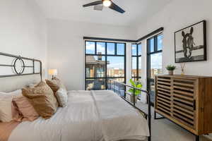 Carpeted bedroom with visible vents