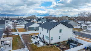 Drone / aerial view featuring a mountain view and a residential view