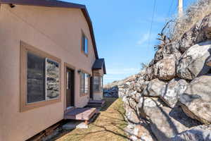 View of yard featuring entry steps