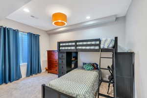 Bedroom with baseboards, carpet, visible vents, and recessed lighting