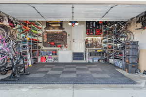 Garage featuring a workshop area