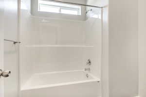 Bathroom featuring shower / tub combination