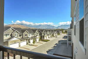 Property view of mountains featuring a residential view