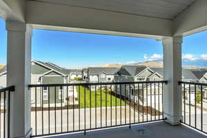 Balcony with a mountain view and a residential view