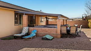 View of patio / terrace with fence, a mountain view, and outdoor dining space