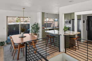 Dining space with light wood finished floors