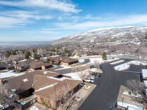 Drone / aerial view with a residential view and a mountain view