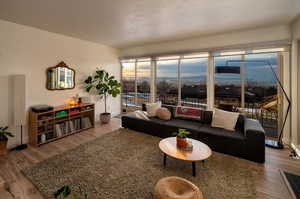 Living room featuring baseboards and wood finished floors